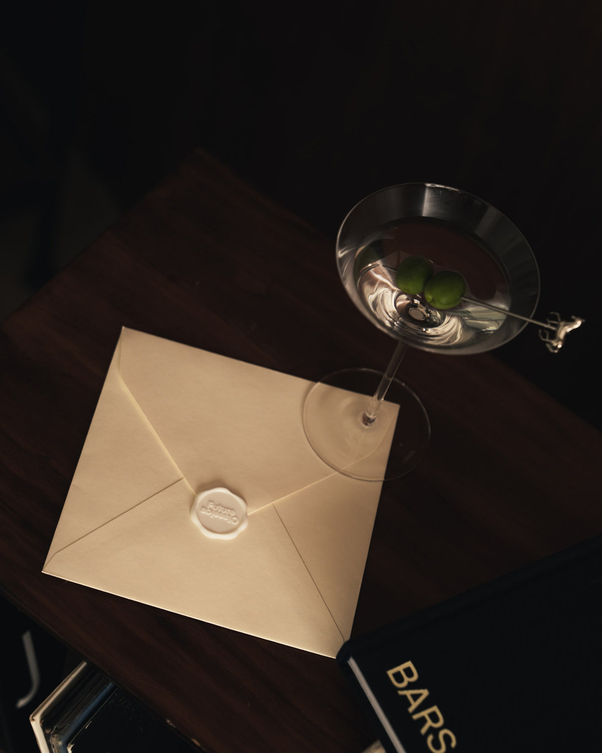 Future Classics D2 hero right: sealed envelope and martini